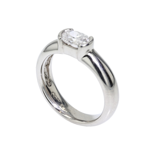 Platinum Half Bezel Set Oval Engagement Ring